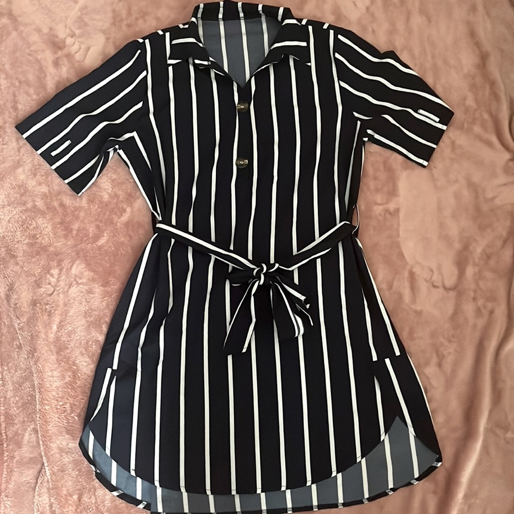Blue and white striped dress. Dress comes to Mid Thigh Depending On Your Shape.